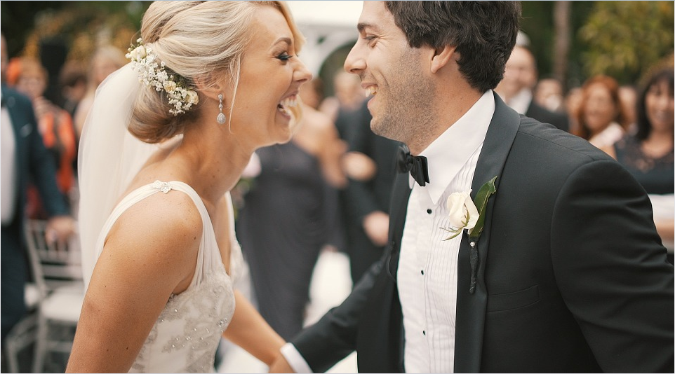 a man and a woman tying the knot